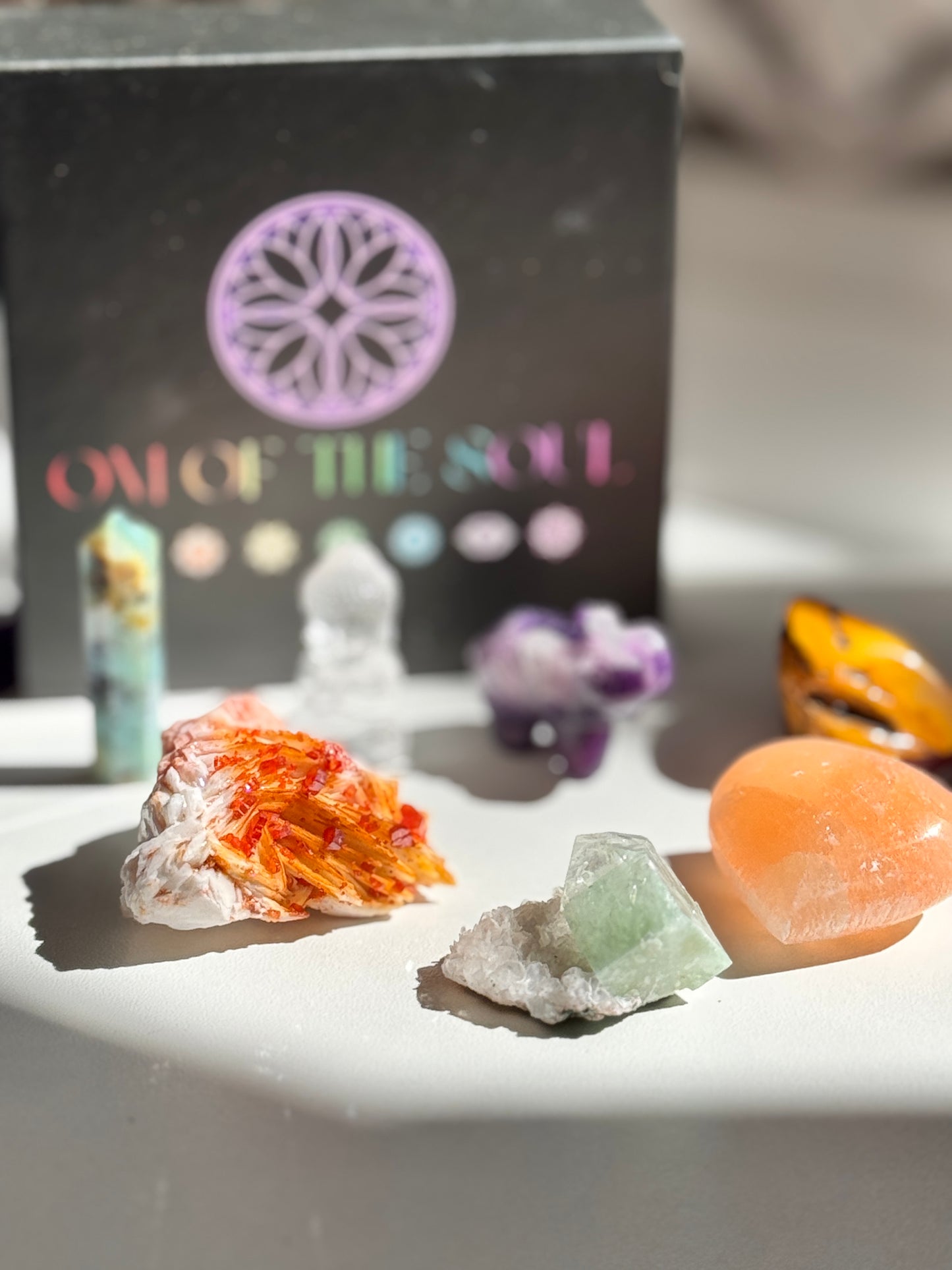 Packaged in a luxe magnetic keepsake box, this set includes:
Vanadinite (Root Chakra): A bold burst of grounding and creative drive
Orange Selenite Heart (Sacral Chakra): Gentle flow, sensuality, and emotional nourishment
Mookaite Jasper Tumble (Solar Plexus Chakra): Vitality, self-trust, and personal strength
Green Apophyllite (Heart Chakra): Heart-softening clarity and love-energy activation
Chrysoprase Tower (Throat Chakra): Truthful expression and inner renewal
Lepidolite Elephant (Third Eye Chakra)