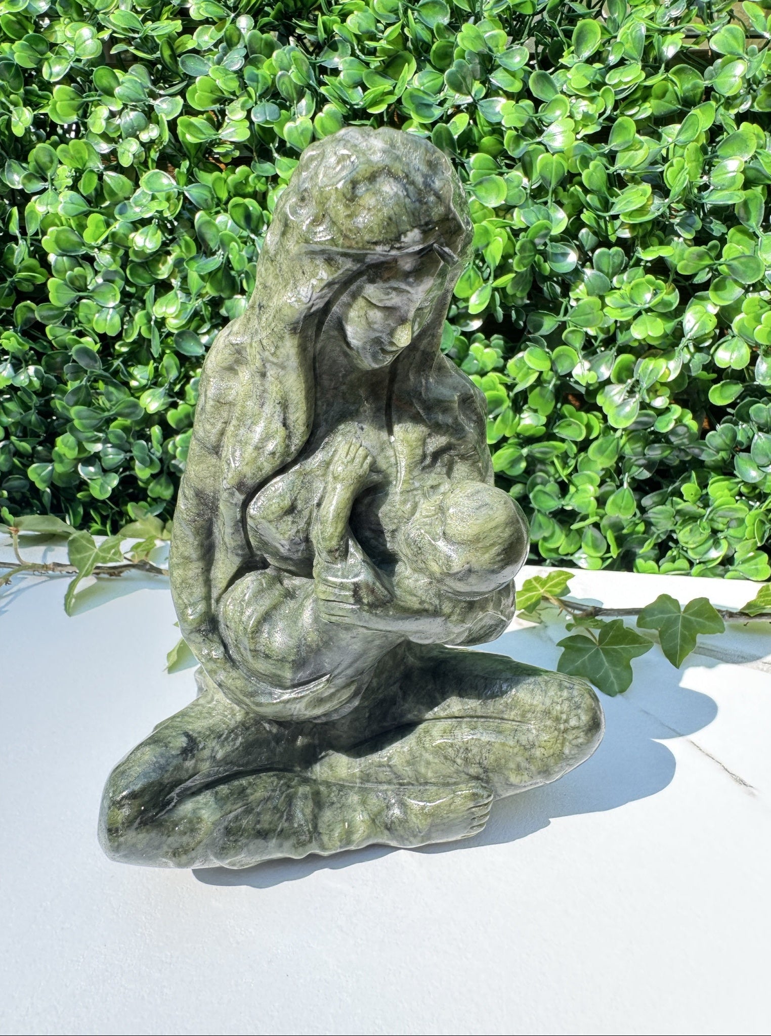 Jade carving, breastfeeding mother and child