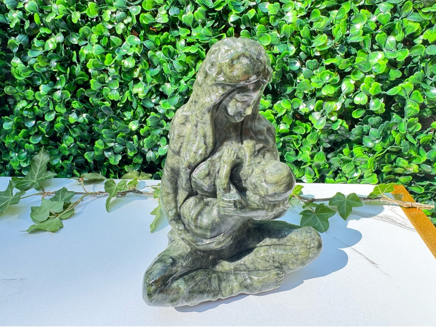 Jade carving, breastfeeding mother and child