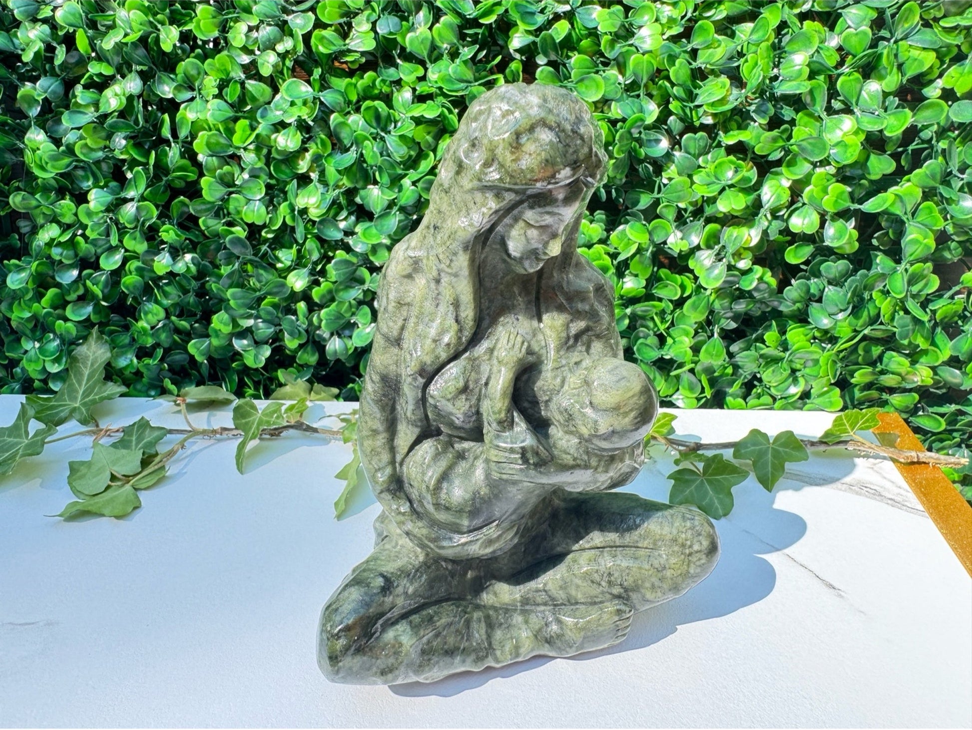 Jade carving, breastfeeding mother and child